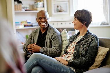 carers talking on sofa