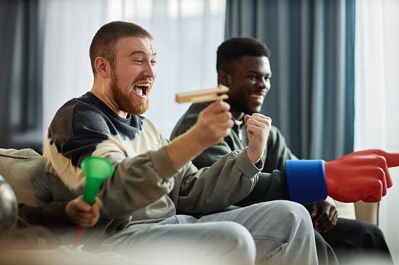 housemates having fun at event in home